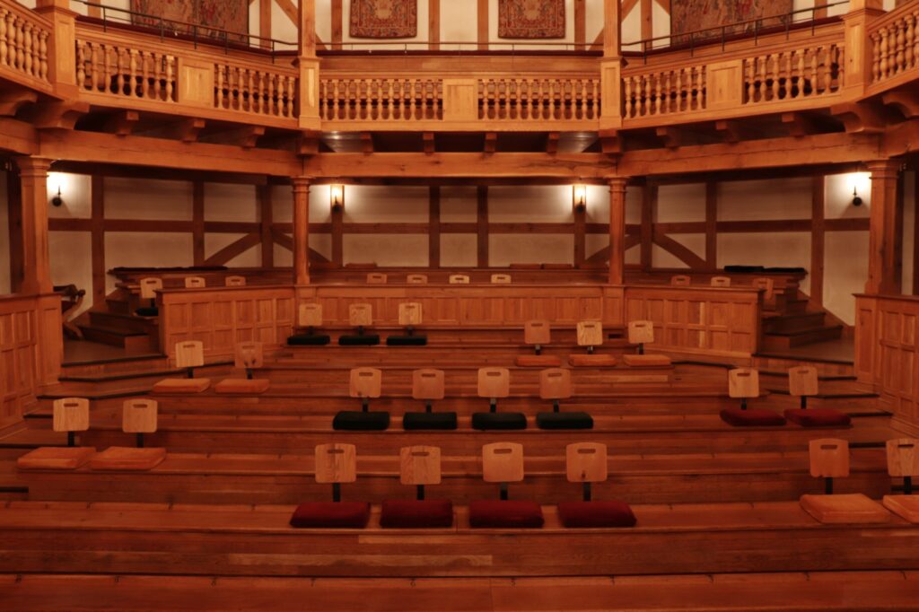 photo of the theater with seats spaced out for social distancing