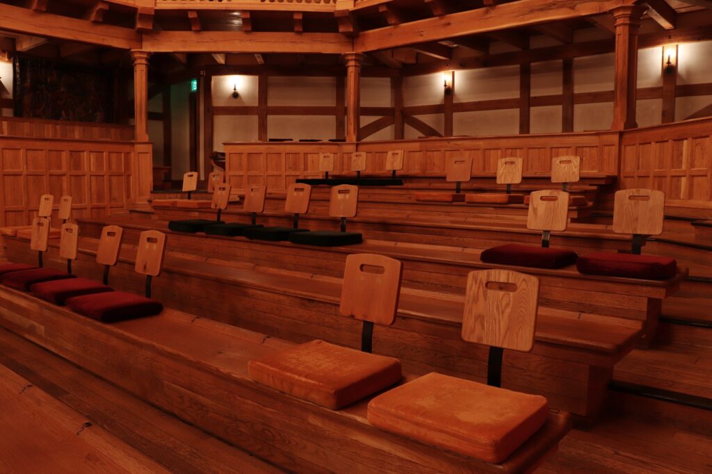 photo from another angle of the theater with seats spaced out for social distancing