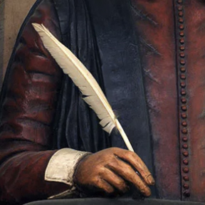 photo of Shakespeare's effigy above his grave, showing his right hand holding a quill